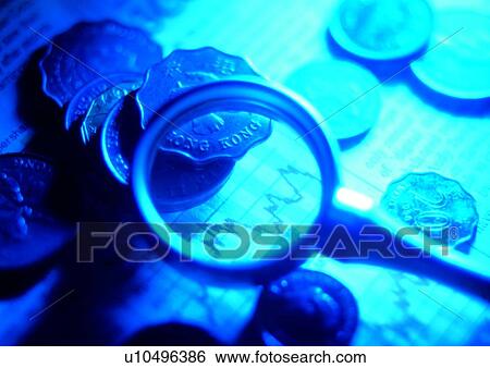 Stock Photograph - indoor, newspaper, coin, light, shadow, change, cash. Fotosearch