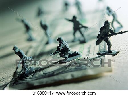 Stock Photo - light, money, cash, solider, shadow, toy. Fotosearch
