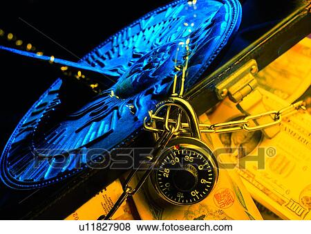 Stock Photo - lock, indoor, light, money, business, suitcase. Fotosearch
