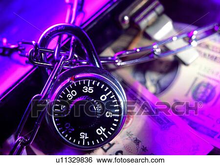 Stock Photograph - money, cash, indoor, shadow, suitcase, light. Fotosearch