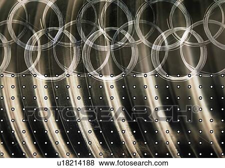 Stock Photo - Entwined rings superimposed on a dotted background. Fotosearch