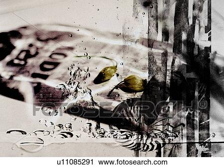 Stock Image - Splash of water superimposed on a brown background. Fotosearch