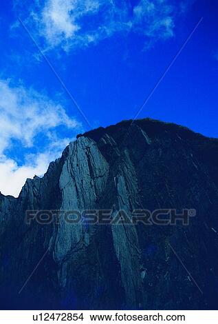 Picture - sky, cloud, grass, mountain, nature. Fotosearch