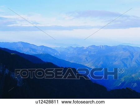 Stock Image - sun light, cloud, peak, sky, mountain, nature. Fotosearch