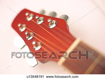 Stock Image - Close-Up, Colored Background, Cut Out, Fret, Guitar. Fotosearch