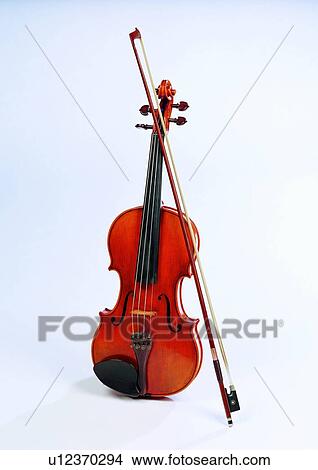 String, Musical Instrument, Two Objects, Bow, Skill, String Instrument View Large Photo Image Picture - String, Musical Instrument, Two Objects, Bow, Skill, String Instrument. Fotosearch