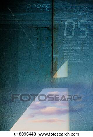 Stock Photo - Close-up of digital numbers superimposed on a grey background. Fotosearch