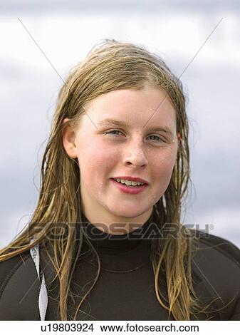Picture - Portrait of female surfer with wet hair. Fotosearch