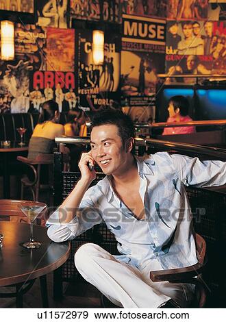 Bar, Chatting, Asian, Black Hair, Asian Ethnicity View Large Photo Image Stock Photo - Bar, Chatting, Asian, Black Hair, Asian Ethnicity. Fotosearch