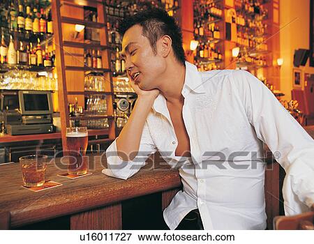Beer, Casual Clothing, Beer Bottle, Nights Out, Brown Hair View Large Photo Image Stock Photo - Beer, Casual Clothing, Beer Bottle, Nights Out, Brown Hair. Fotosearch