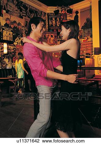 Stock Image - Black Hair, Leisure Activity, Asian Ethnicity, Fun. Fotosearch