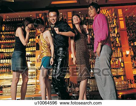 Stock Photograph - Button Down Shirt, Asian Ethnicity, Fun, Casual Clothing, Asian. Fotosearch