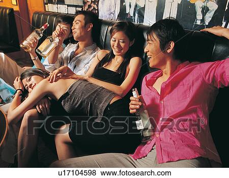 Cheerful, Bar, Celebration, Relaxation, Looking Away, Friendship, Black Hair View Large Photo Image Stock Photo - Cheerful, Bar, Celebration, Relaxation, Looking Away, Friendship, Black Hair. Fotosearch