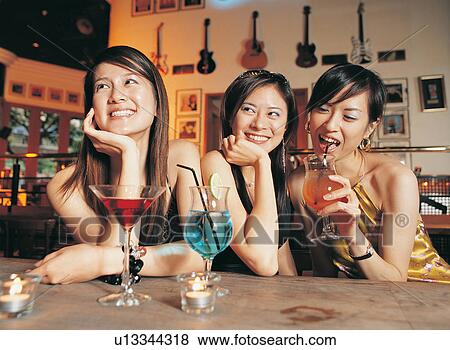 Stock Photo - Drinking, Single Woman, Holding, Cheerful, Youth Culture, Head And Shoulders. Fotosearch