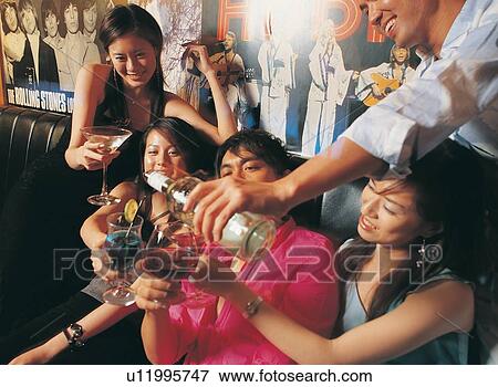 Long Hair, Party, Night Life, Asian, Casual Clothing, Brown Hair, Waist-Up View Large Photo Image Stock Photo - Long Hair, Party, Night Life, Asian, Casual Clothing, Brown Hair, Waist-Up. Fotosearch