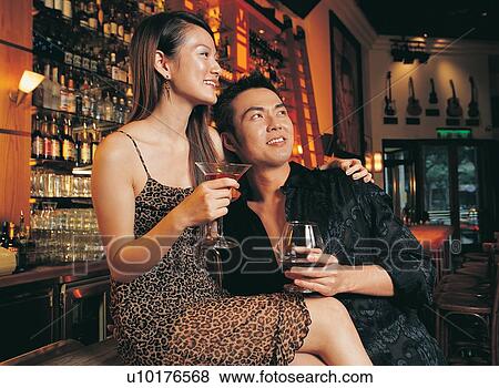 Togetherness, Looking Up, Fun, Young Adult, Open Collar, Romantic, Young Couple View Large Photo Image Stock Photo - Togetherness, Looking Up, Fun, Young Adult, Open Collar, Romantic, Young Couple. Fotosearch