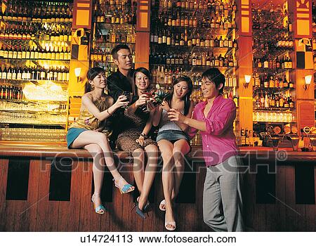 Young Adult, Three-Quarter Length, Celebration, Sitting, Indoor View Large Photo Image Stock Image - Young Adult, Three-Quarter Length, Celebration, Sitting, Indoor. Fotosearch