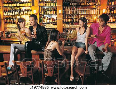 Young Men, Party, Fun, Young Women, Chatting, Smiling, Asian Ethnicity View Large Photo Image Stock Photography - Young Men, Party, Fun, Young Women, Chatting, Smiling, Asian Ethnicity. Fotosearch