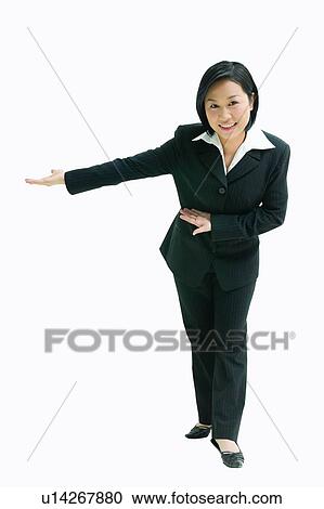 Stock Image - Black Hair, Hospitality, Well-Dressed, Cheerful. Fotosearch