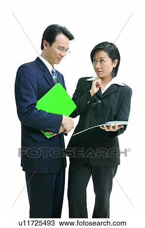 Stock Image - Businesswomen, Asian Ethnicity, Businessmen, Business Suit, Black Hair, Adults Only. Fotosearch