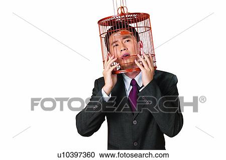 Caged, Black Hair, Cage, Businessman, Business Suit, Asian Ethnicity View Large Photo Image Stock Image - Caged, Black Hair, Cage, Businessman, Business Suit, Asian Ethnicity. Fotosearch