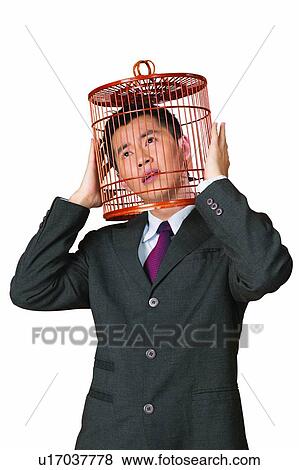 Caged, Black Hair, Cage, Businessman, Business Suit, Asian Ethnicity View Large Photo Image Stock Photo - Caged, Black Hair, Cage, Businessman, Business Suit, Asian Ethnicity. Fotosearch