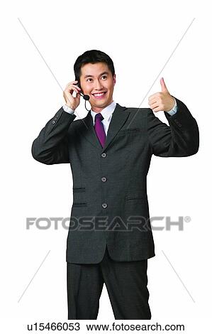 Cheerful, Asian Ethnicity, Businessman, Business Suit, Black Hair, Agreement View Large Photo Image Stock Image - Cheerful, Asian Ethnicity, Businessman, Business Suit, Black Hair, Agreement. Fotosearch