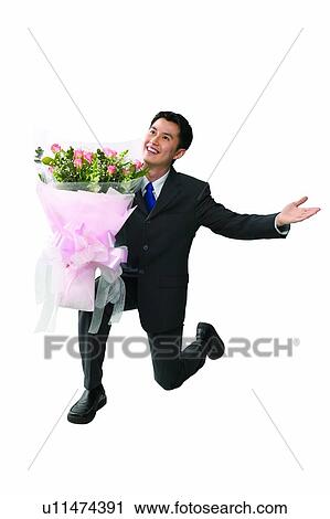 Cheerful, Black Hair, Businessman, Business Suit, Bouquet, Asian Ethnicity View Large Photo Image Stock Image - Cheerful, Black Hair, Businessman, Business Suit, Bouquet, Asian Ethnicity. Fotosearch