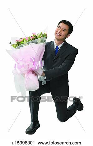 Cheerful, Black Hair, Businessman, Business Suit, Bouquet, Asian Ethnicity View Large Photo Image Stock Image - Cheerful, Black Hair, Businessman, Business Suit, Bouquet, Asian Ethnicity. Fotosearch