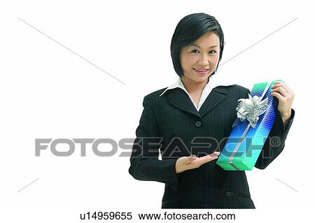 East, Businesswoman, White Background, Gift, Wrapping Paper, Open Collar, Cheerful View Large Photo Image Stock Photography - East, Businesswoman, White Background, Gift, Wrapping Paper, Open Collar, Cheerful. Fotosearch