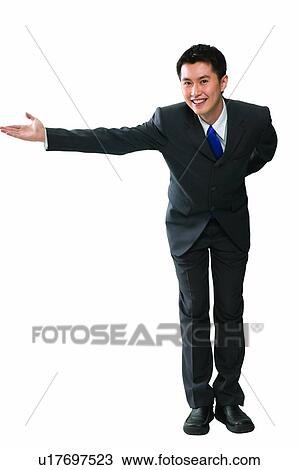 Stock Image - Grace, Office, Young Adult, Hospitality, One Young Man Only, Well-Dressed. Fotosearch