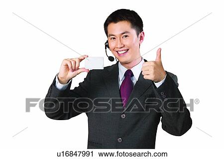 Stock Image - Showing, Well-Dressed, Shirt And Tie, Smiling, Holding. Fotosearch