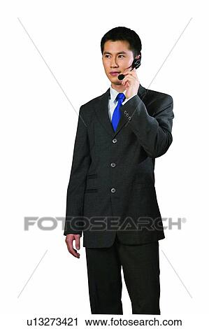 Stock Image - Well-Dressed, Three-Quarter Length, Assistance, Business Suit. Fotosearch