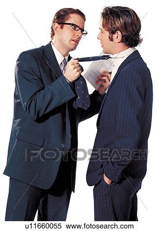Stock Photography - well dressed, hand in pocket, 25 -30 years, happiness, suit, indoor. Fotosearch