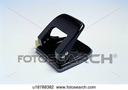Stock Image - stationery, hole punch. Fotosearch