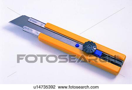 stationery, knife, yellow View Large Photo Image Stock Image - stationery, knife, yellow. Fotosearch