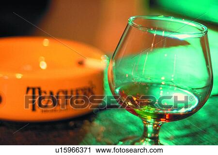 Stock Image - ashtray, yellow, wineglass, object, life, alcohol. Fotosearch