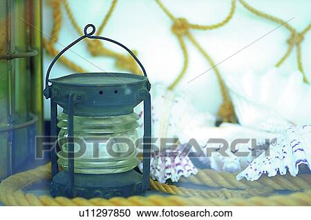 life, shell, lamp, rope, object, decoration View Large Photo Image Stock Image - life, shell, lamp, rope, object, decoration. Fotosearch