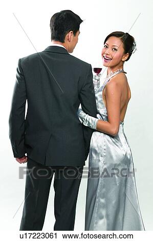 Stock Image - Affectionate, Arm In Arm, Alcoholism, Alcohol, Adults Only. Fotosearch