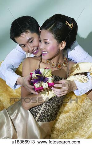 Affectionate, Behind, Asian Ethnicity, Arm Around, Adults Only View Large Photo Image Stock Image - Affectionate, Behind, Asian Ethnicity, Arm Around, Adults Only. Fotosearch