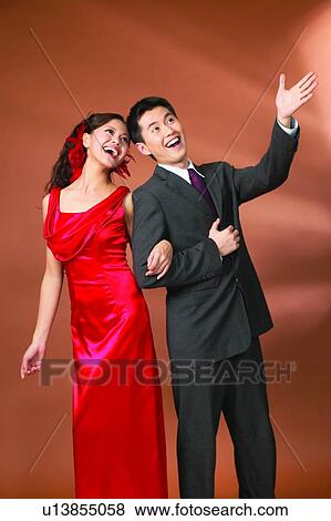 Affectionate, Black Hair, Asian Ethnicity, Arm In Arm, Adults Only View Large Photo Image Stock Photo - Affectionate, Black Hair, Asian Ethnicity, Arm In Arm, Adults Only. Fotosearch