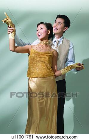 Stock Image - Affectionate, Black Hair, Behind, Asian Ethnicity, Adults Only. Fotosearch