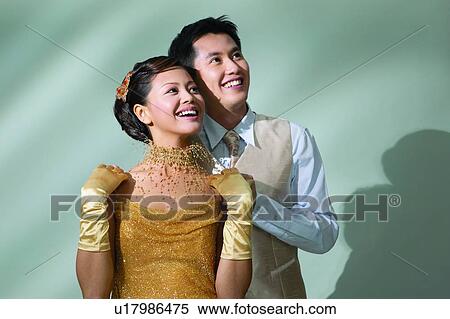 Stock Photography - Affectionate, Black Hair, Behind, Asian Ethnicity, Adults Only. Fotosearch