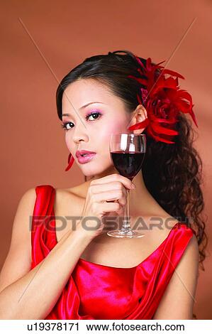 Stock Image - Alcoholism, Black Hair, Beverage, Asian Ethnicity, Alcohol. Fotosearch