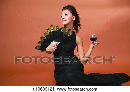 Stock Image - Black Hair, Alcoholism, Black, Beverage, Asian Ethnicity, Alcohol. Fotosearch