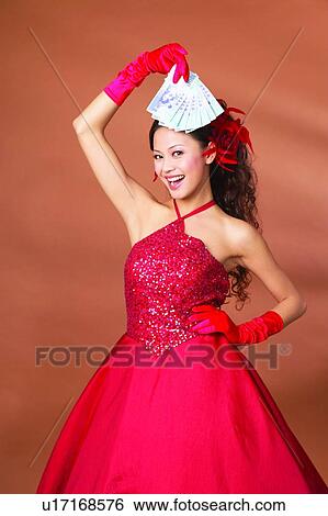 Stock Photograph - Black Hair, Colored Background, Brown, Asian Ethnicity. Fotosearch