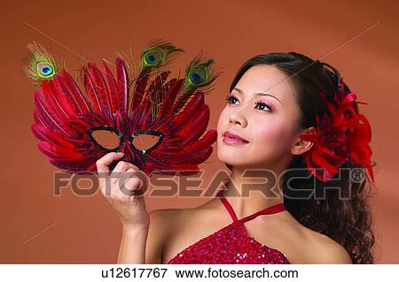 Stock Photo - Black Hair, Colored Background, Close-Up, Asian Ethnicity. Fotosearch