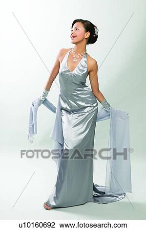 Stock Image - Black Hair, Evening Glove, Dress, Asian Ethnicity. Fotosearch
