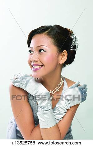 Stock Photo - Black Hair, Evening Glove, Dress, Asian Ethnicity. Fotosearch