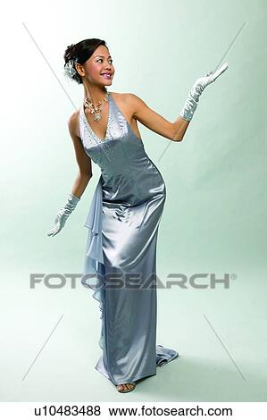 Looking Up, Asian Ethnicity, Bending, Dress, Party Dress, Party View Large Photo Image Stock Photo - Looking Up, Asian Ethnicity, Bending, Dress, Party Dress, Party. Fotosearch